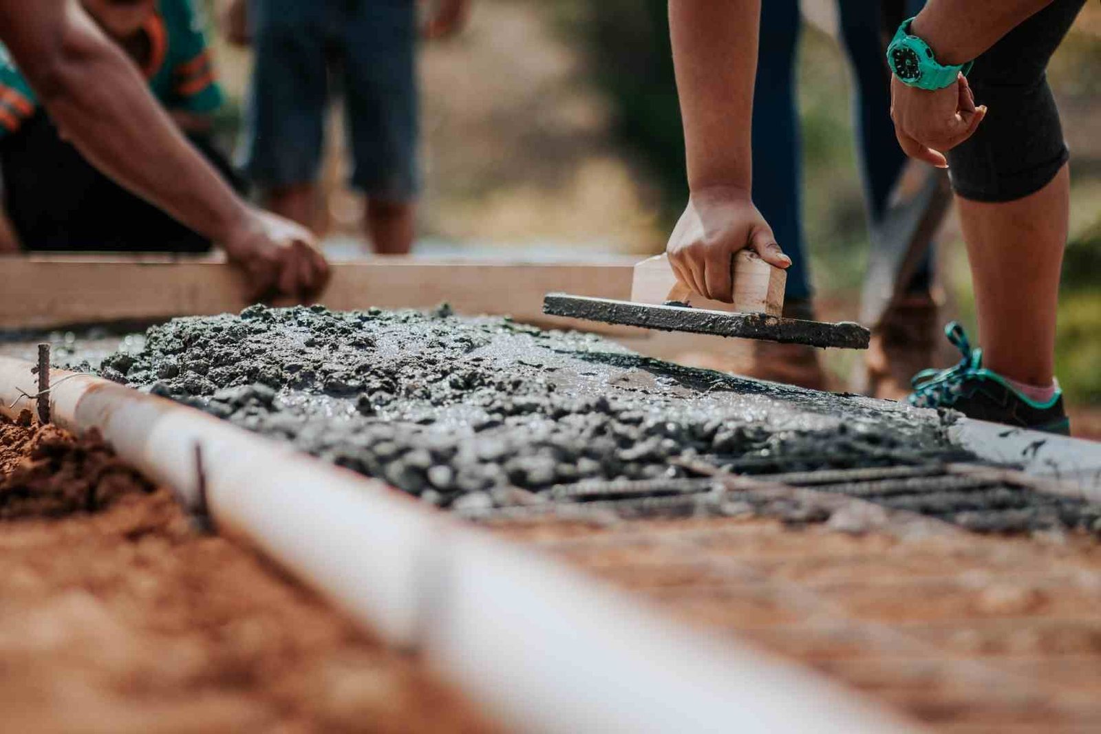 Expert concreters working on a residential concrete driveway project in Willetton WA.