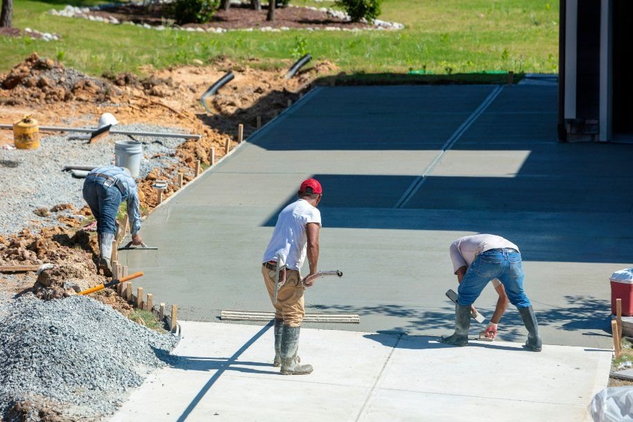 Concreters repairing a cracked concrete driveway of a residential property in Willetton VIC.